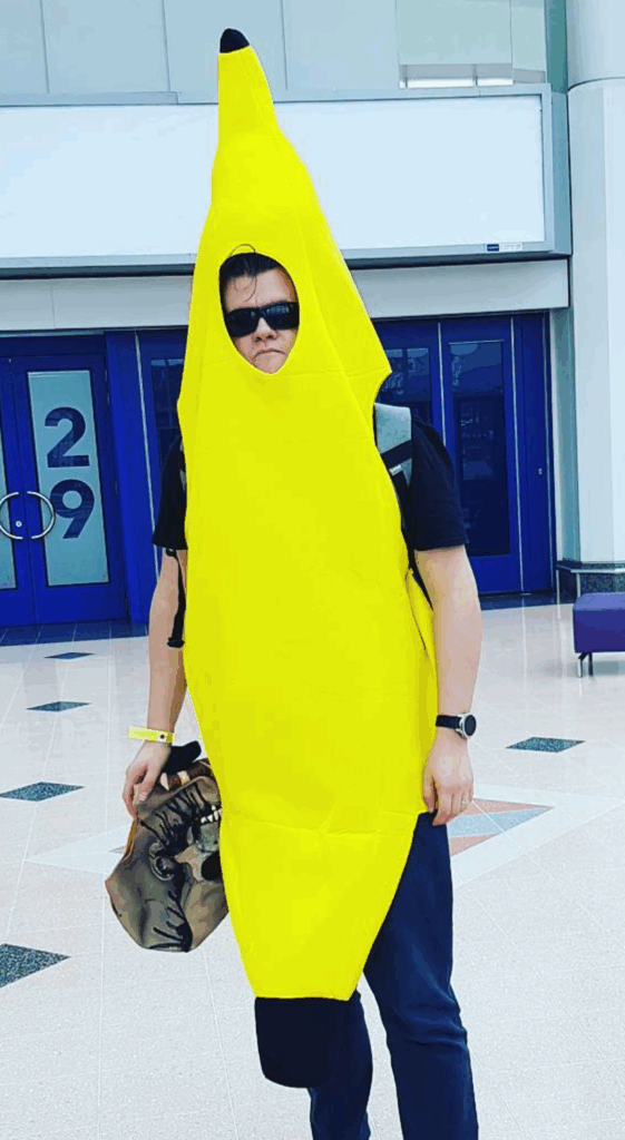 a man wearing a banana suit